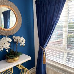 velvet navy curtains in mint conduction with lining.