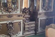 Massive old double vitrine and mirror