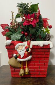 Fake poinsettia in Decorative plant pot