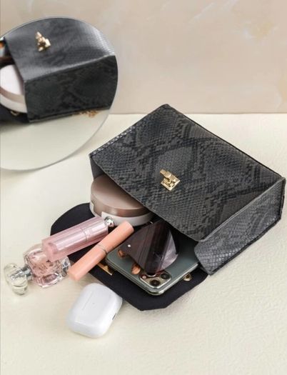 Black snakeskin twist lock bag
