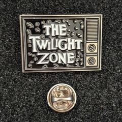 The twilight zone, pin back badge.