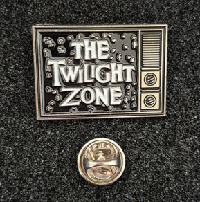 The twilight zone, pin back badge.