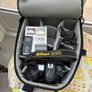 Nikon D300, barely used. Bag and accessories: Li-ion Battery Pack; Charger; 4 GB cards x2; Hahnel Infrapro Remote; Battery Grip; User's Manual; Lowpro Camera Bag. Image 2