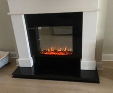 Electric Fireplace & Black Marble inset and hearth