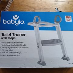 Toilet trainer with steps