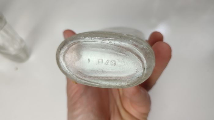 294 - Set of 7 Vintage Clear Glass Decorative Collectible Display Household Bottles