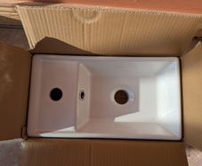 Compact bathroom basin