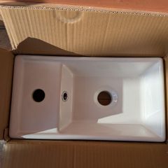 Compact bathroom basin