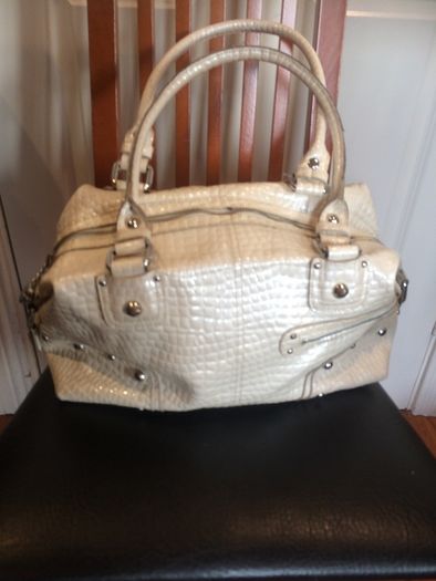 Hand bags. Rucksacks, clutch bags, purses