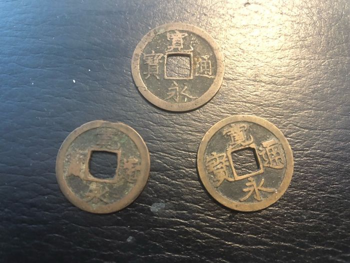 3 Japanese copper coins