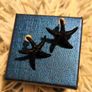 Small Shiny Earrings with Black Starfish Motif Elegant Minimal Style Image 9