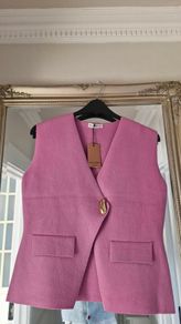 Brand new sleeveless cardigan