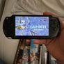 psp inc charger and 5 games Image 2