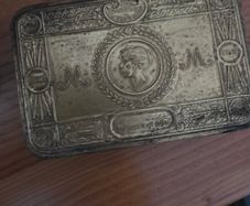 1914 tin with pencil holder