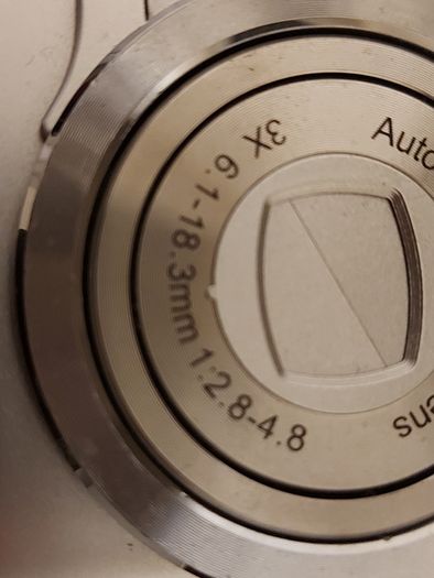 Z880 Digital Camera, Takes 2AA Batteries, working fine, has a modification that doesn't affect its performance