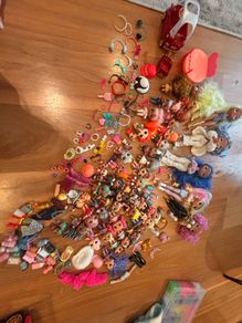 34 LOL dolls + 5 OMG dolls + 9 babies +5 pets & 159 accessories & a LOL doll limited edition car with pool and disco!