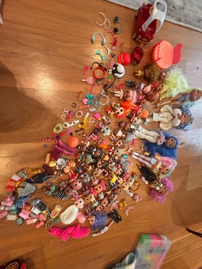 34 LOL dolls + 5 OMG dolls + 9 babies +5 pets & 159 accessories & a LOL doll limited edition car with pool and disco!