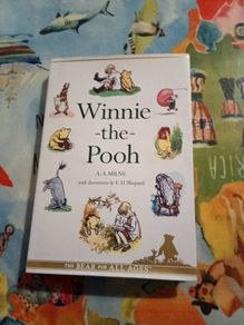 Winnie the Pooh by A A Milne with decorations by E H Shepard