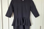 Elegant black peplum dress