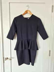 Elegant black peplum dress