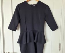 Elegant black peplum dress