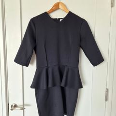 Elegant black peplum dress