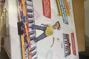 Gigantic keyboard playmat