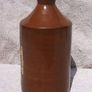 Stoneware antique ink bottle (large size 7.5" high) - made by Joseph Bourne of Denby (1880's - 1910's). Superb condition with remnants of label. Image 2