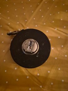 Antique measuring tape tool