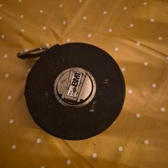 Antique measuring tape tool