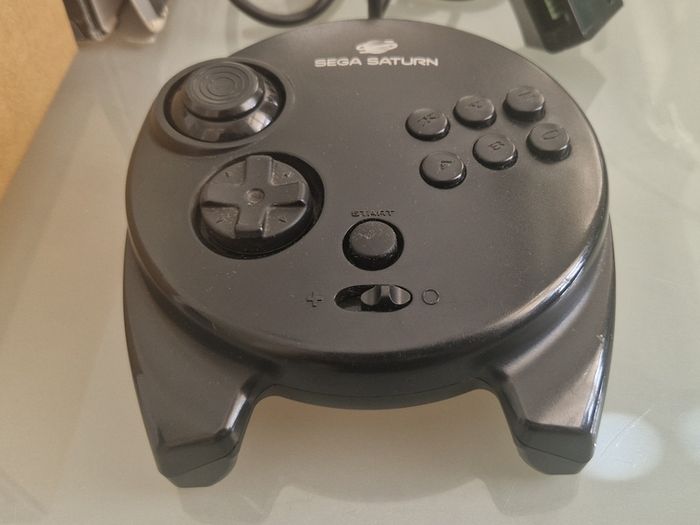 Sega Saturn w/ 3D Control Pad, Arcade Racer, Lightgun and Games