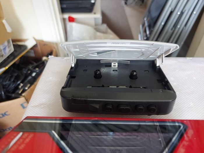 Sony Walkman and Sanyo AM-FM Stereo cassette Player, excellent cosmetic condition, no cables or batteries