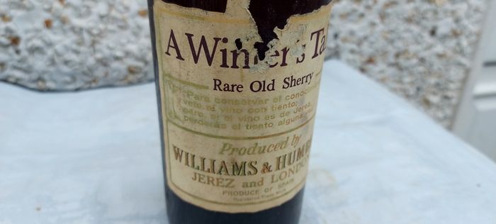 vintage bottle of winters tale sherry 3/4 full ,found in a old pub closed down,