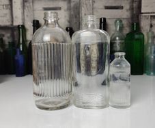 333 - Set of 3 Vintage Clear Glass Collectible Decorative Ribbed Bottles