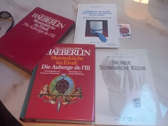 3 hardback books on cooking, 1 French, 2 in German, D18 post 16e