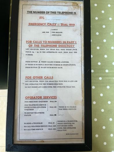 Framed AB Payphone Notices