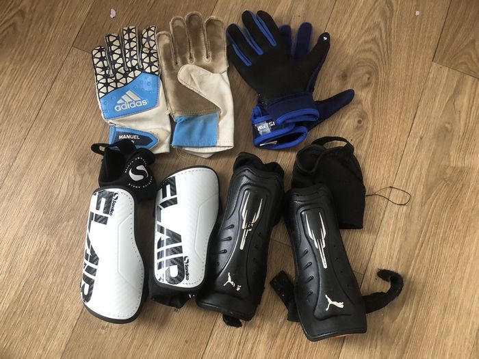 football gloves & shin pads .