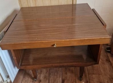 Folding space saving table