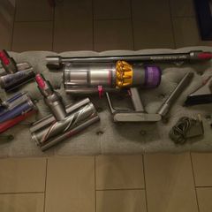 Dyson v15 hoover with new genuine accessories