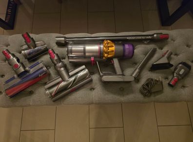 Dyson v15 hoover with new genuine accessories