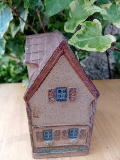 Miniature house, piggy bank, money box, savings box