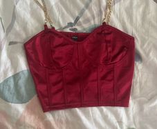 Red corset top with gold chains