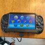 PS Vita with case, charger and 2 memory cards Image 4