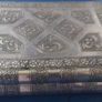 Book-shaped silver jewellery box with purple velvet lining Image 3