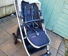 Uppababy Cruz V2 with newborn insert and adapters