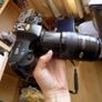 Old heavy Olympus OM101 Camera with lens. Image 2