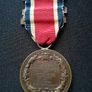 Antique 1911-12 King George V LCC School Medal - Named (E. Simeon) Image 2
