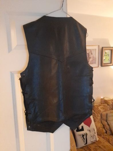 Selection of quality motorbike jackets,  trousers,  helmets  , and boots ..