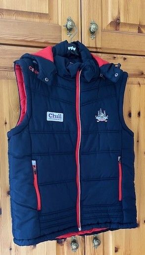 O'Neills CORK GAA Padded Puffer Gilet  jacket Navy. CORCAIGH. Detachable hood.  Size small adult. In Excellent condition