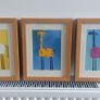Lovely Set of Three Framed Prints of Brightly Coloured Artworks of Animals in a Naive And Fun Style Perfect for a Baby Nursery or Kids Bedroom Image 2